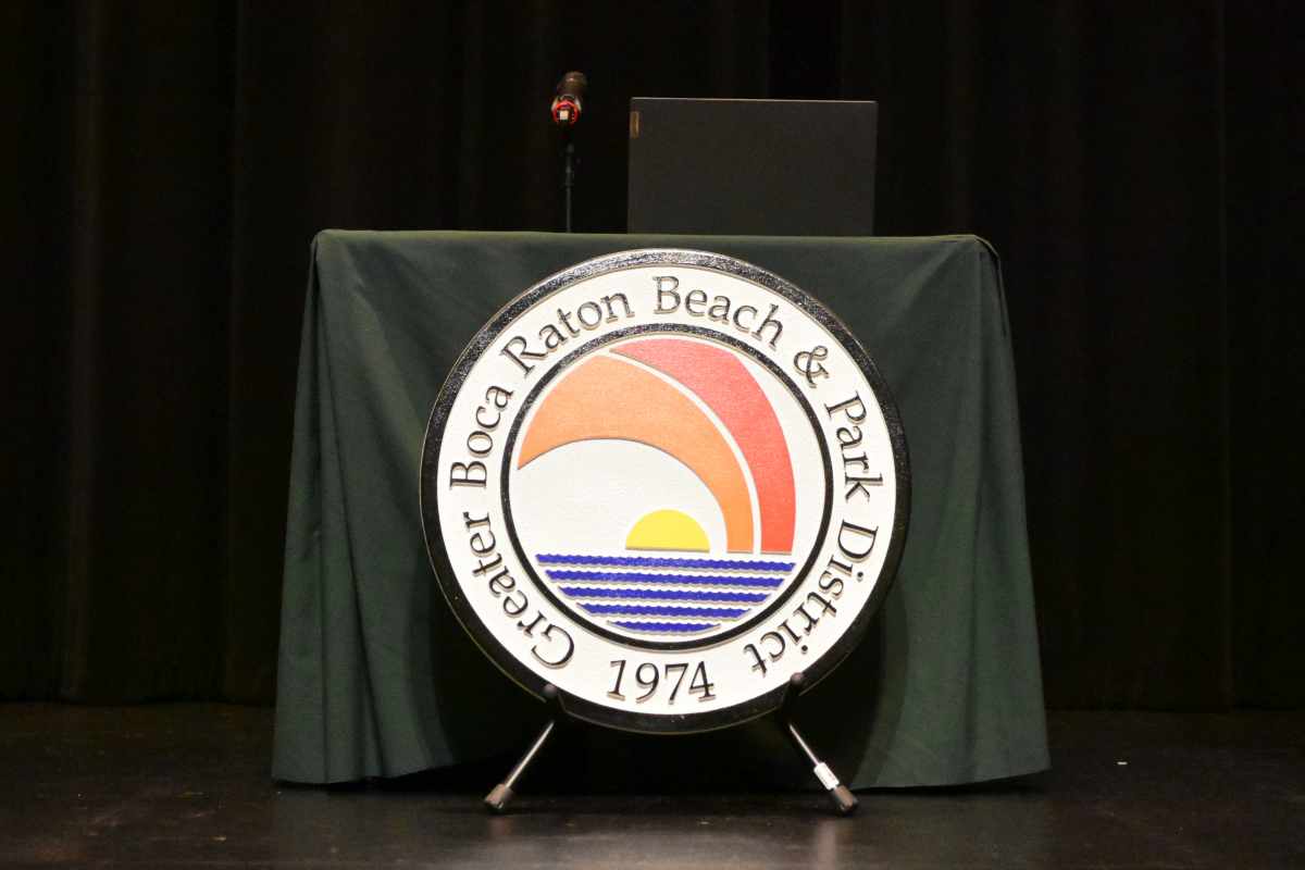 District seal in front of new desk