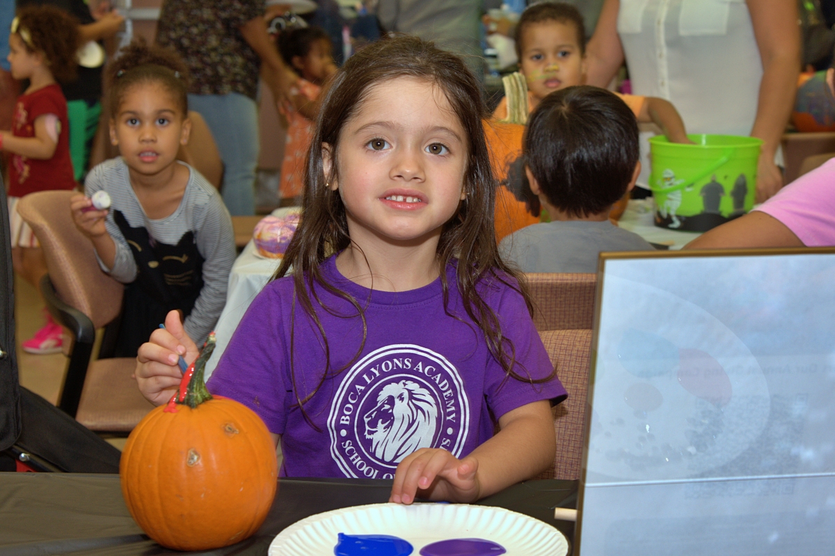 Girl with pumpkin