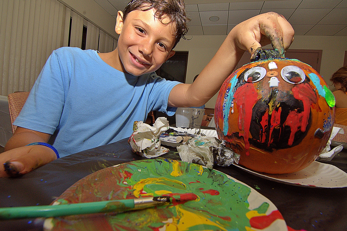 Boy with pumpkin and palette