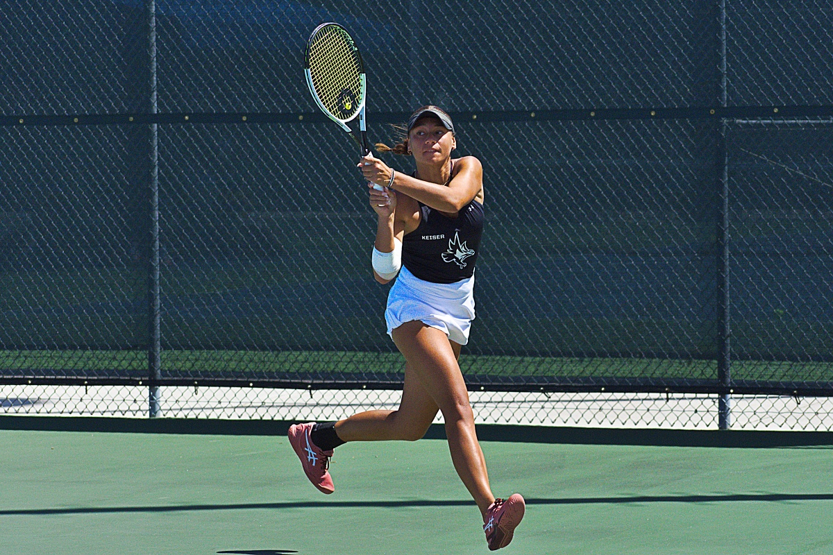 Keiser's Violet Apisah follows through on a backhand.