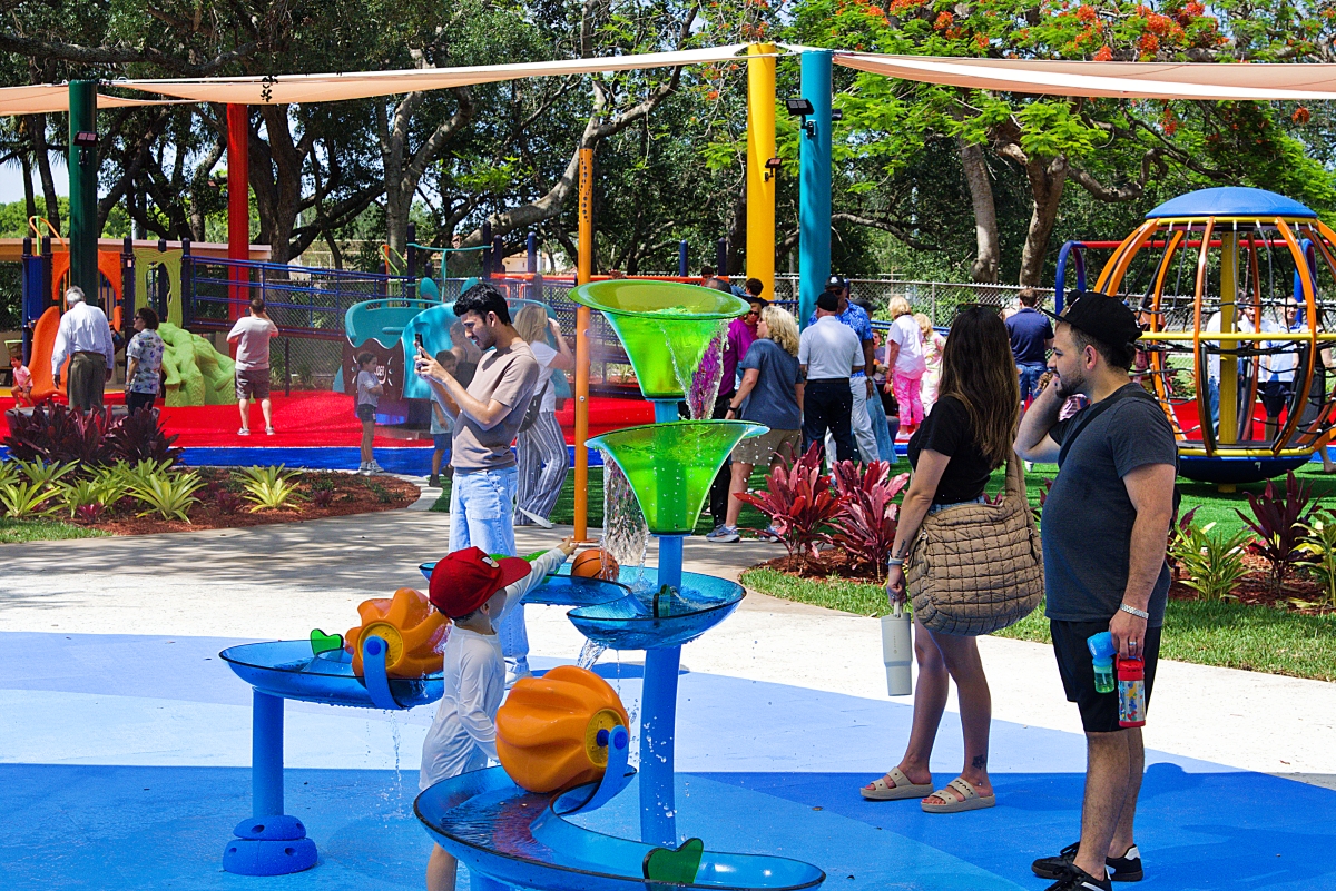 The new splash pad proved to be a big hit at the new playground