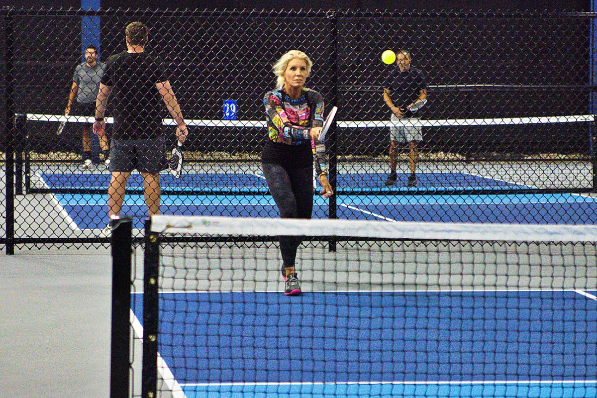 Sherise Ralston returns a shot