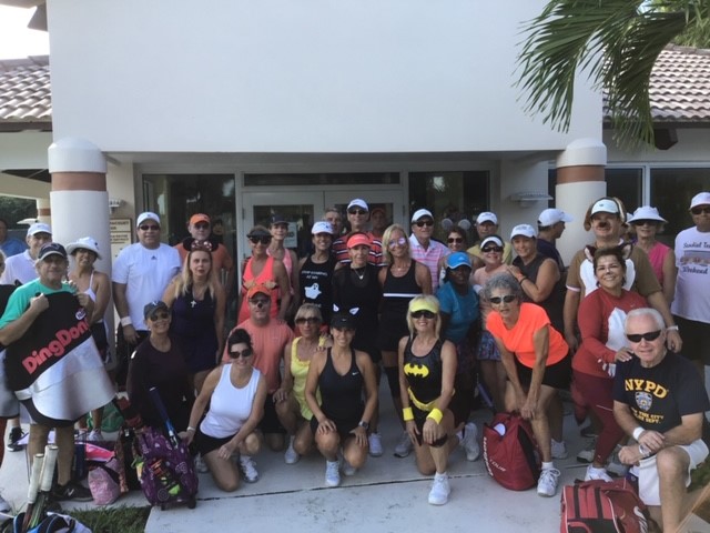 Round Robins Players in front of tennis Pro Shop