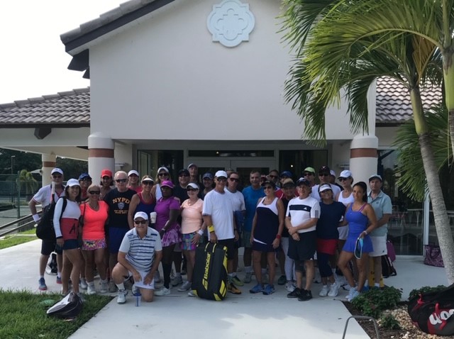 Round Robins Players in front of tennis Pro Shop