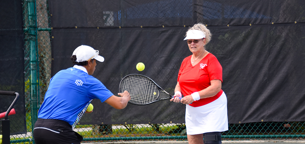 Playing tennis