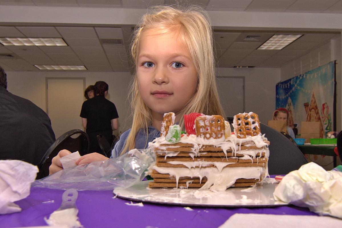 A girl looking over her house