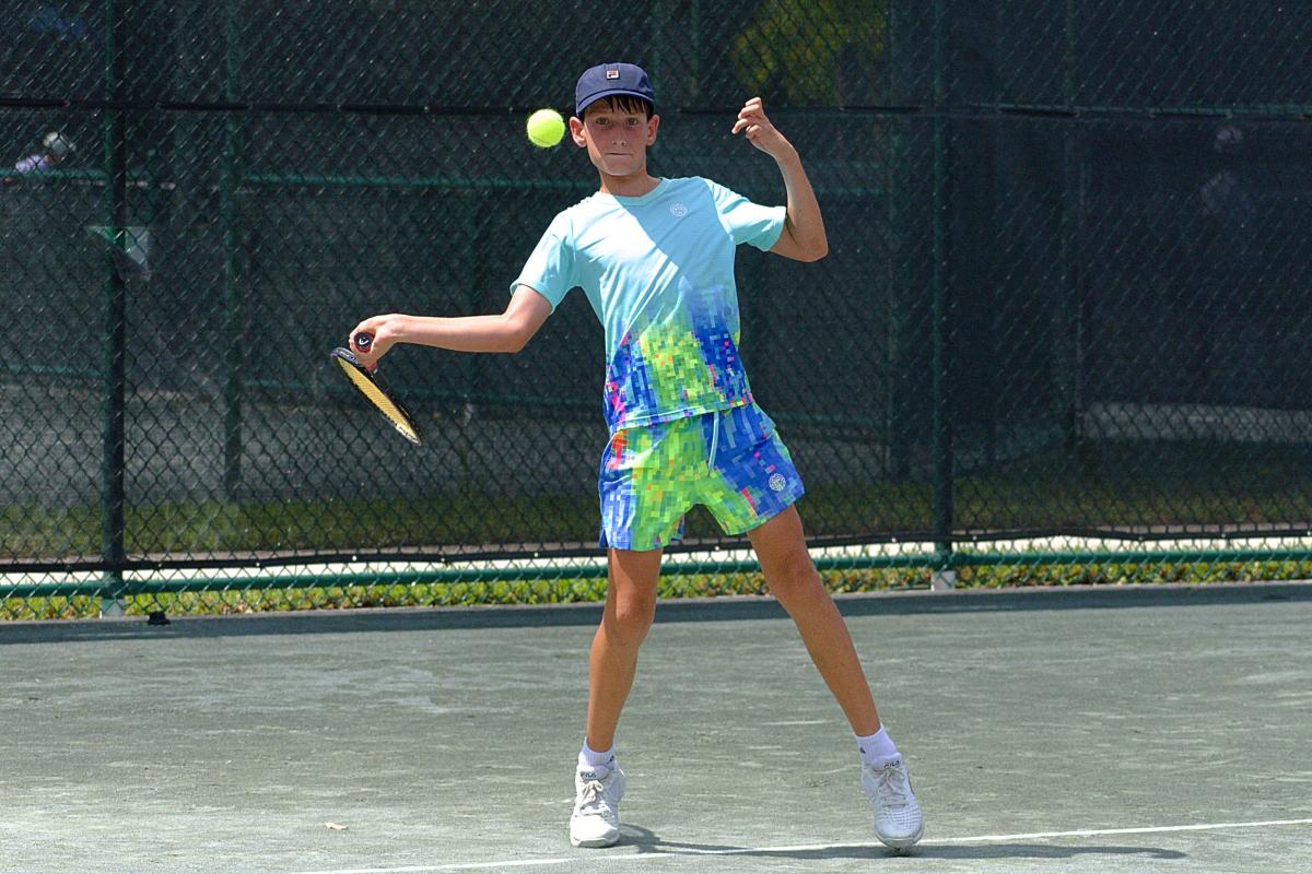 Michael Livson hit a forehand