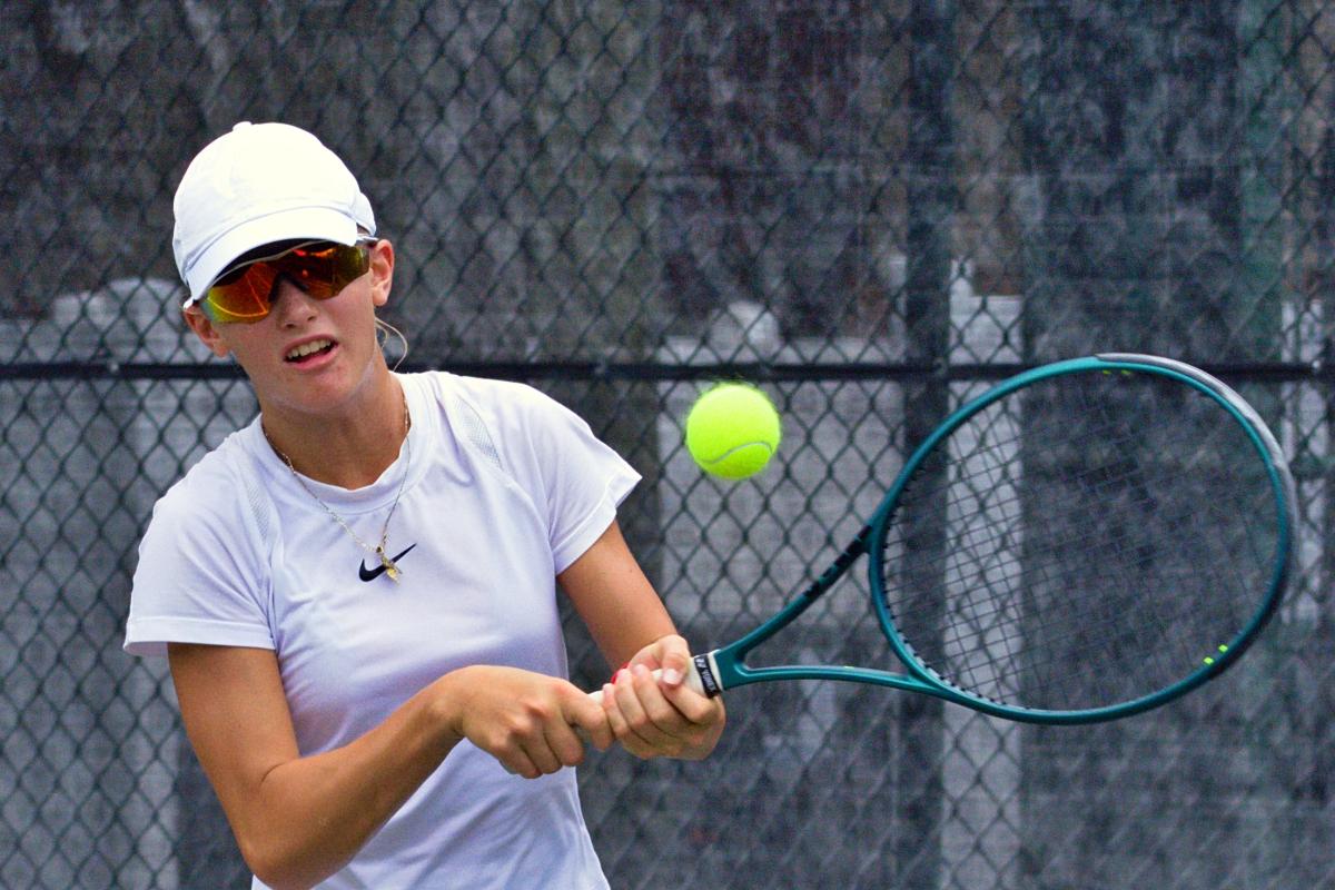 Sofia Dvordzova hitting a backhand