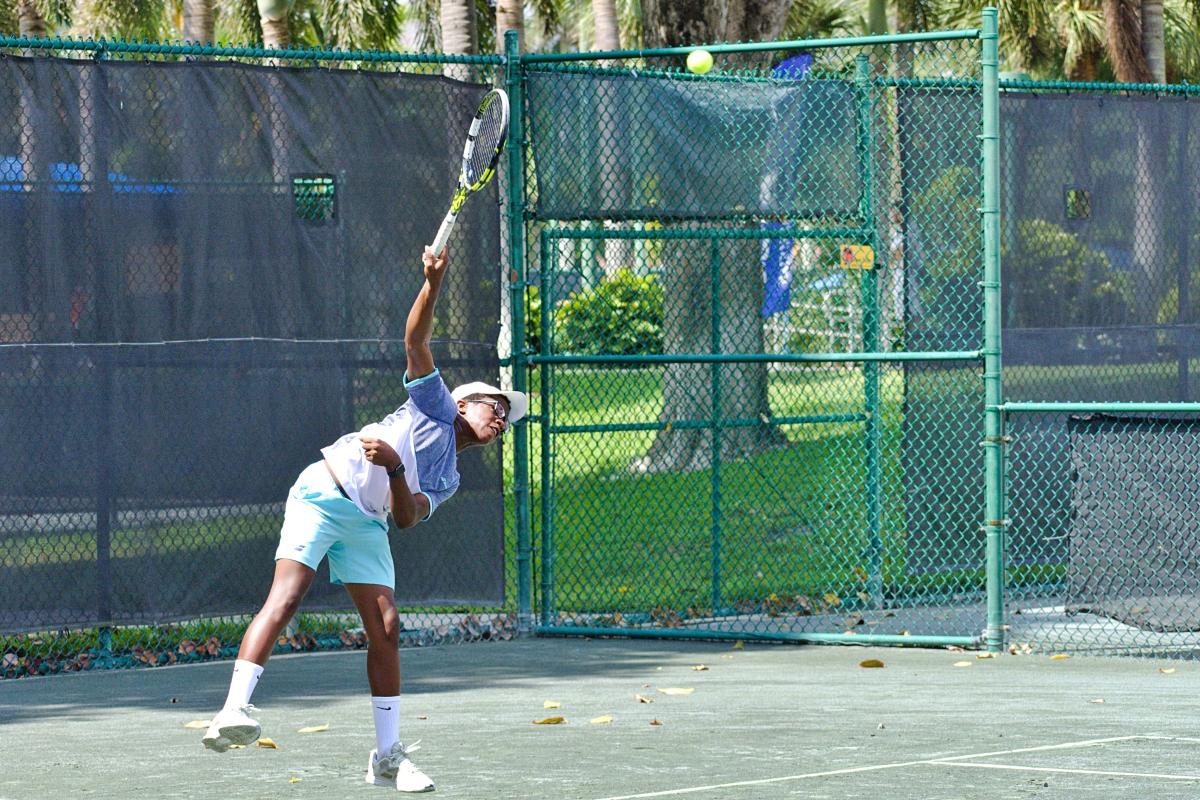 Selwyn Olufemi-Owoeye serves