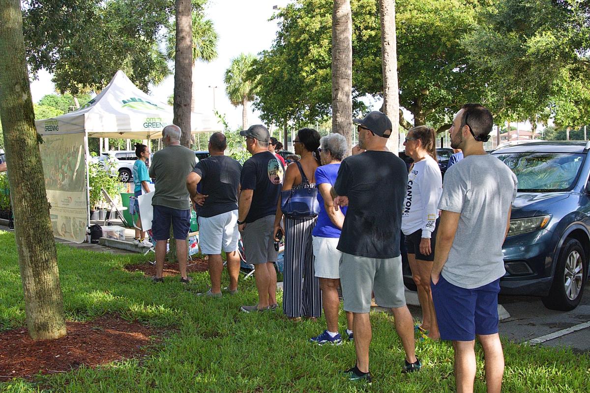 Residents lined up early to get their free trees