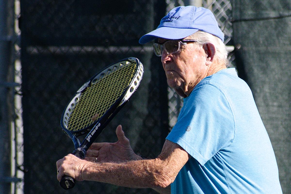 Howie Levinson prepares to hit a backhand.