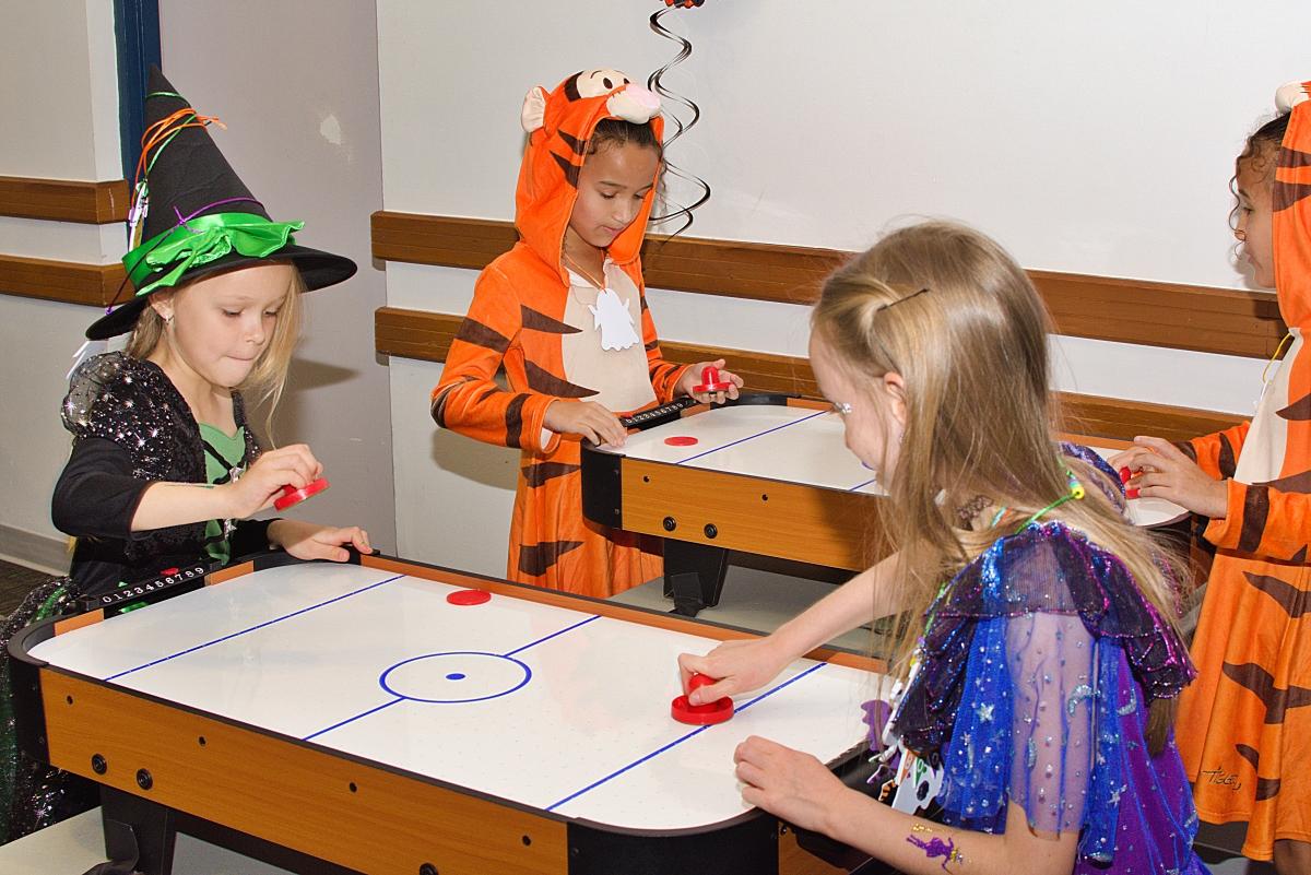 costumed air hockey