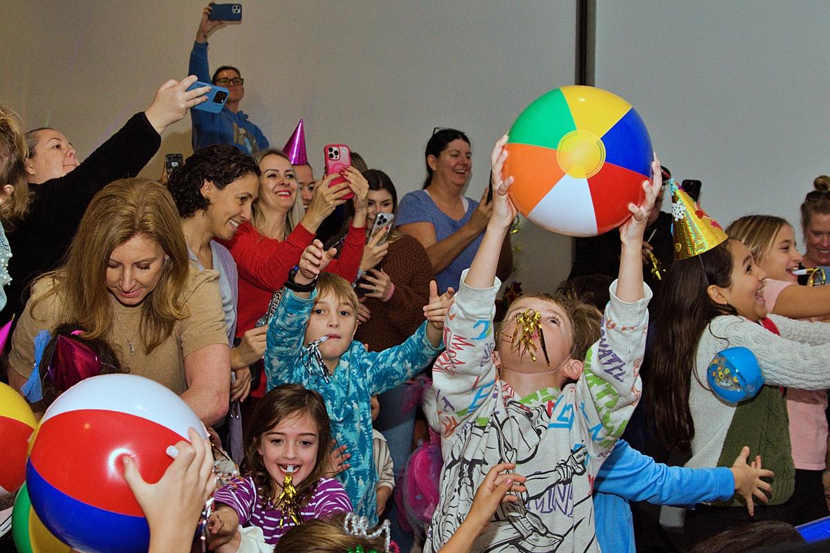 Grabbing a beach ball