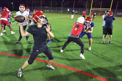 Boca Braves QB Aidan Tropepe throws a pass