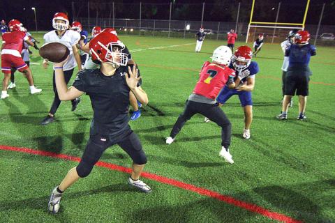 Boca Braves QB Aidan Tropepe throws a pass